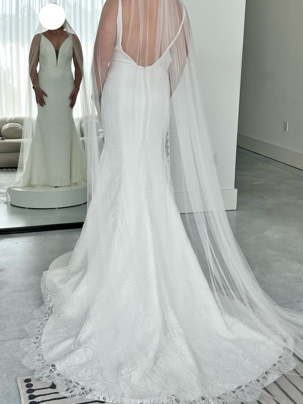Plunging V-Neck White Lace Bridal Gown